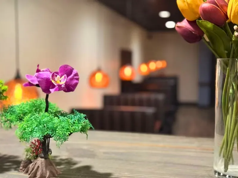 Dining table with decorative plants and flowers at Osaka Ripley, a Japanese Restaurant in Ripley