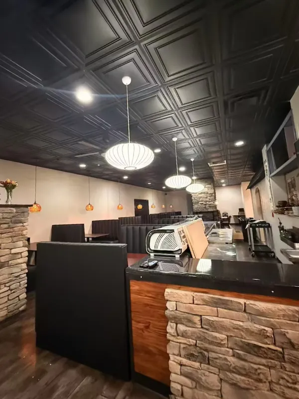 Main dining and sushi bar with stone walls at Osaka Ripley, a Japanese Restaurant in Ripley