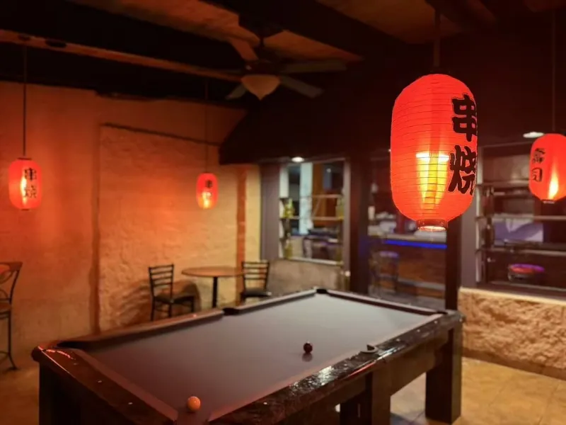Lounge with pool table and red lanterns at Osaka Ripley, a Japanese Restaurant in Ripley